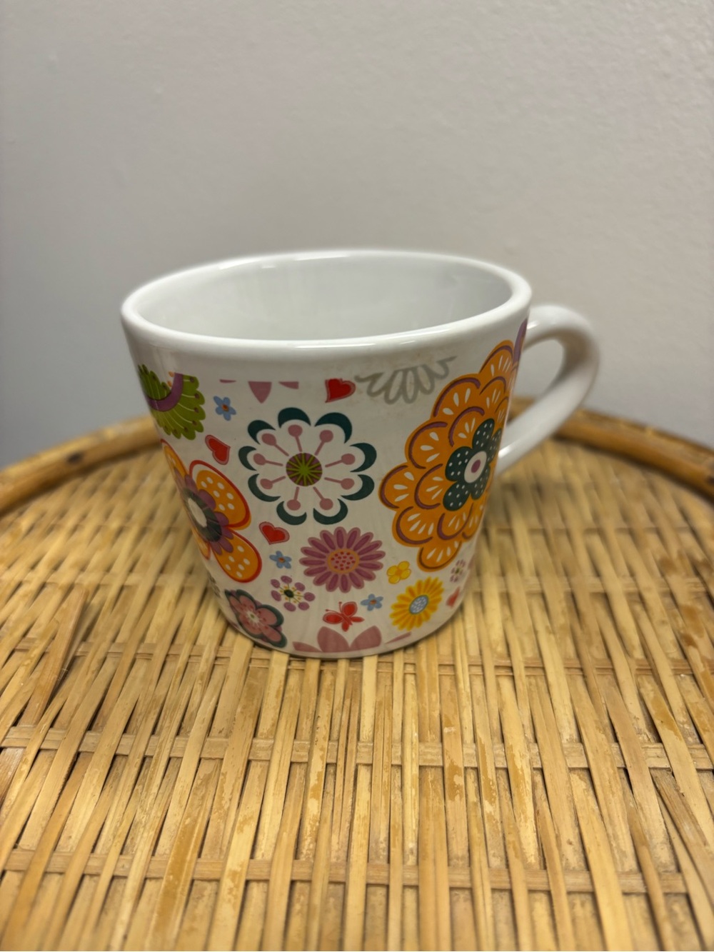 White Ceramic Coffee Mug with Multicolor Floral Pattern